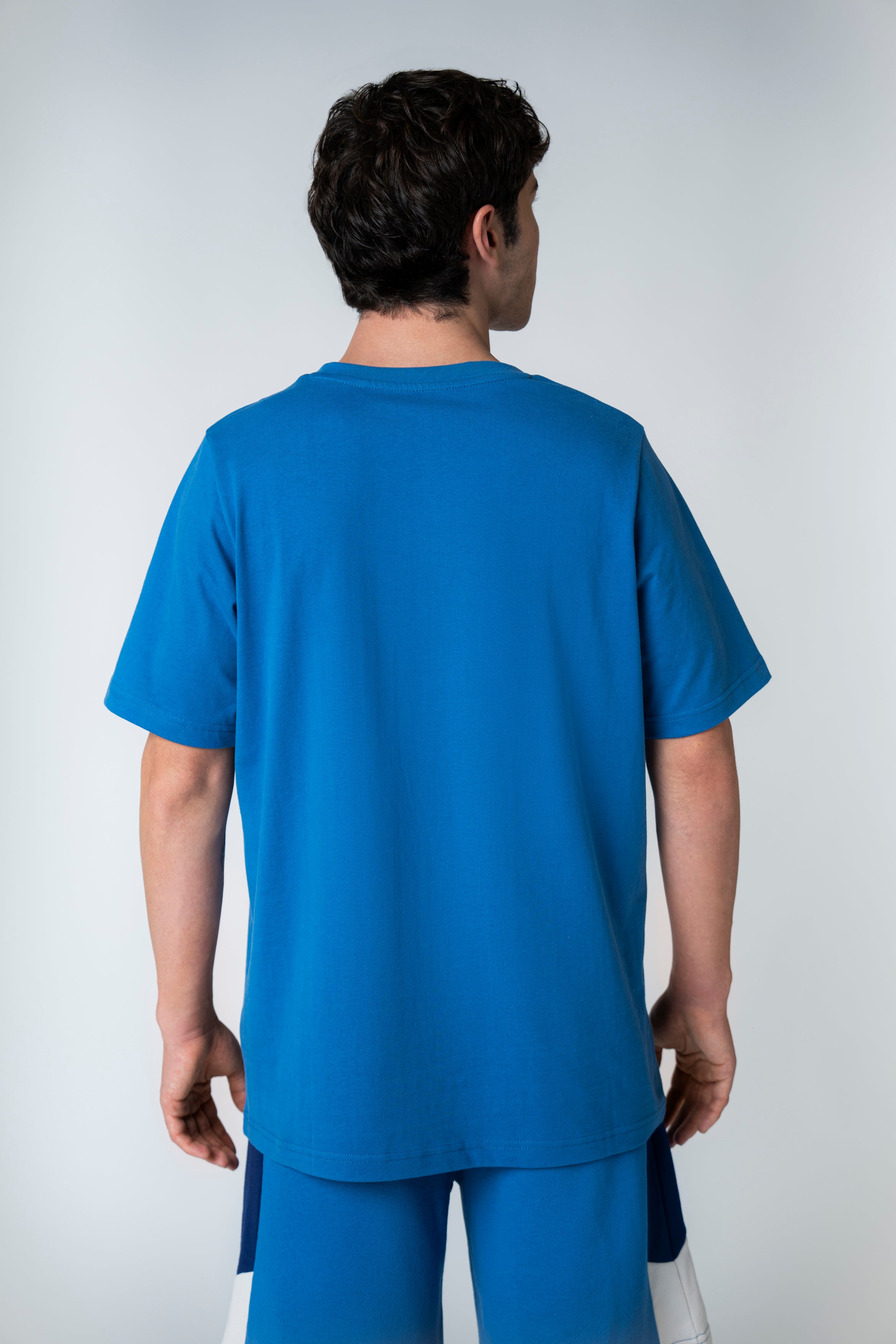 Collection of Camiseta Essential UACO azul in a gallery layout