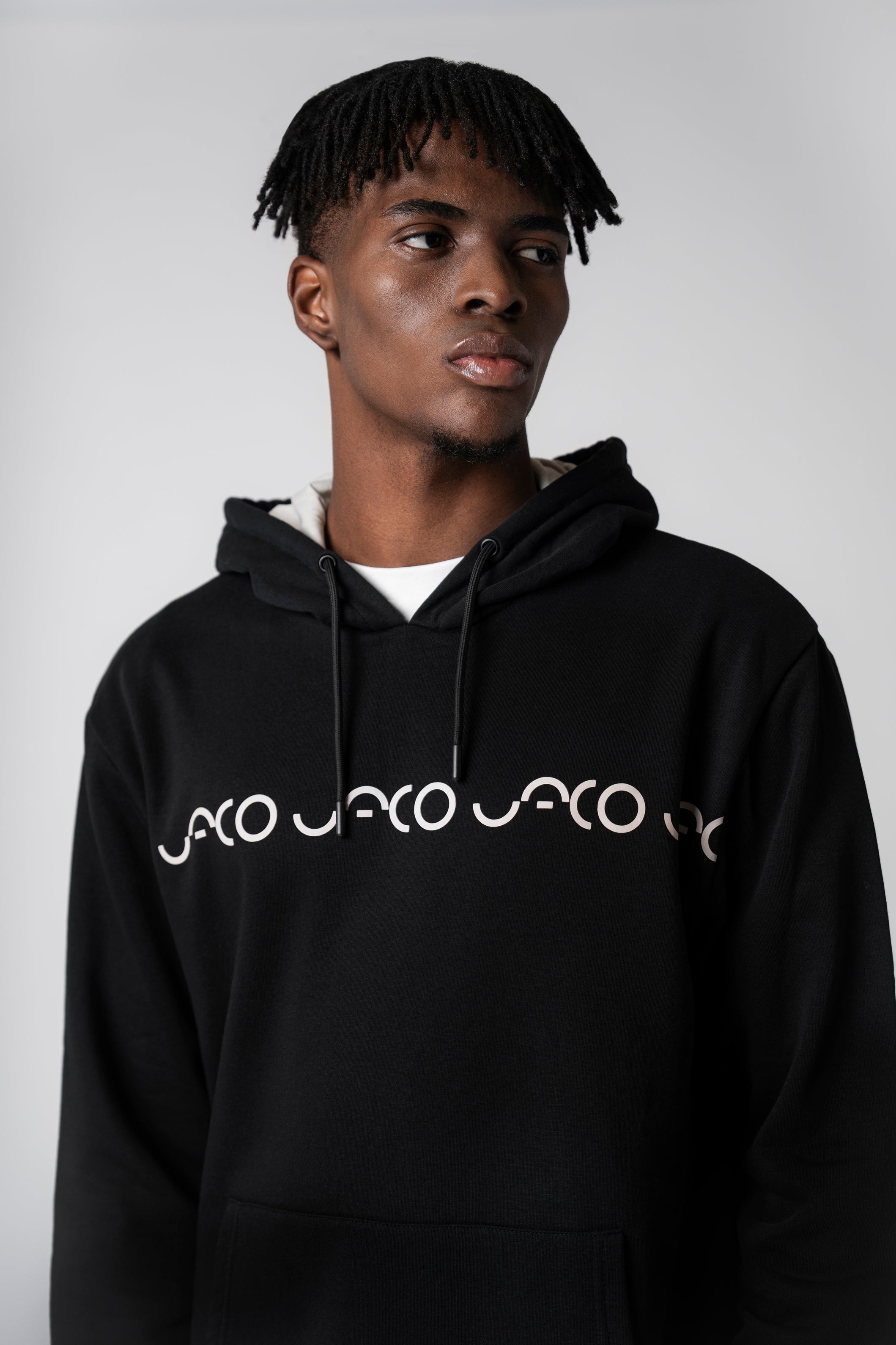 Collection of Sudadera UACO con capucha negra in a gallery layout